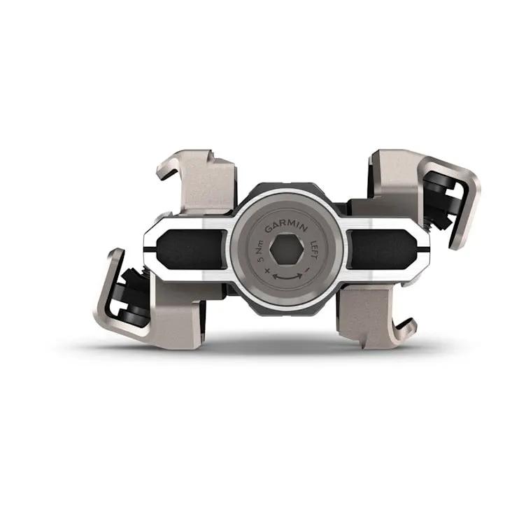 Garmin Rally XC110 single-sensing power meter pedal unit, metallic beige-gray with black accents.