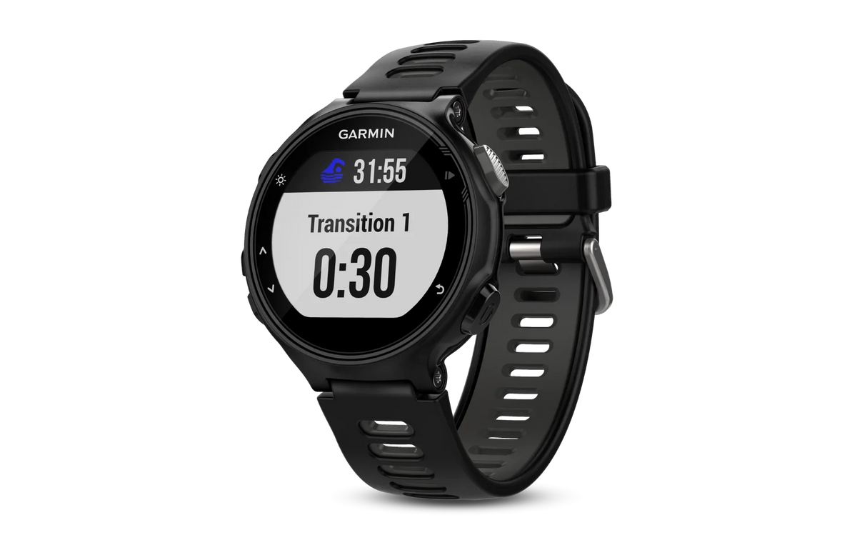 Garmin Forerunner 735XT smartwatch in black with gray strap, Garmin logo visible, round digital display