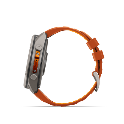 Garmin Fenix 9 Pro inReach AMOLED smartwatch, 51mm titanium case, orange silicone band, side view, angled.