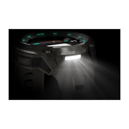 Garmin Instinct Crossover AMOLED smartwatch in rugged black with green LED indicators and side flashlight